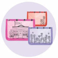 Three small bags with different designs on a white background