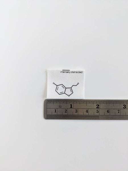 INTENSELY DISTRACTED | Cotton Labels - Serotonin. This is What Happiness Looks Like